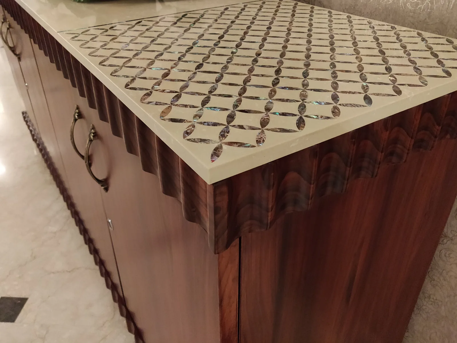 Console with mother-of-pearl inlay at Central Park 1, Golf Course Road, Gurgaon by SpaceTalk Designs