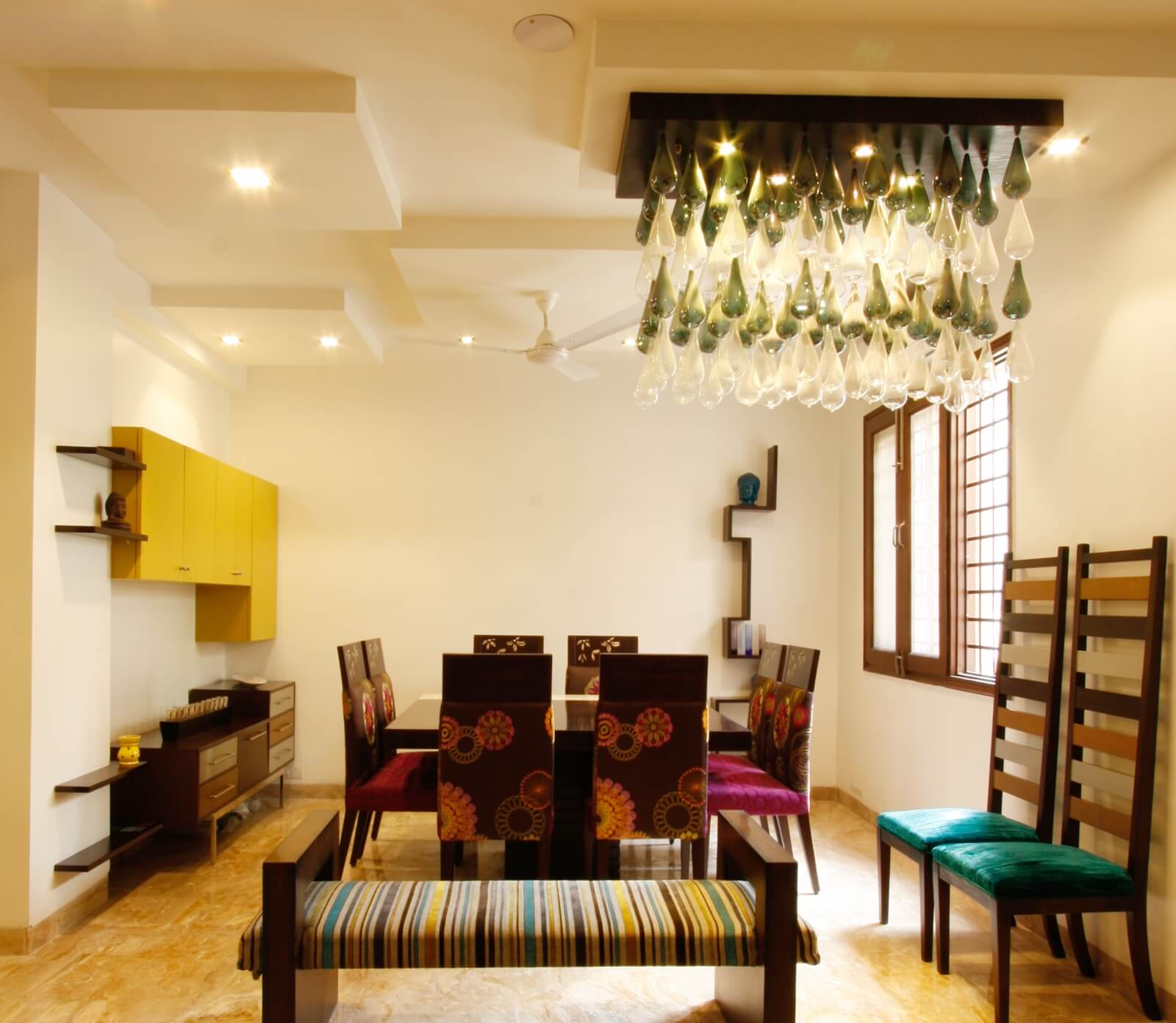 Dining room with custom yellow cabinetry