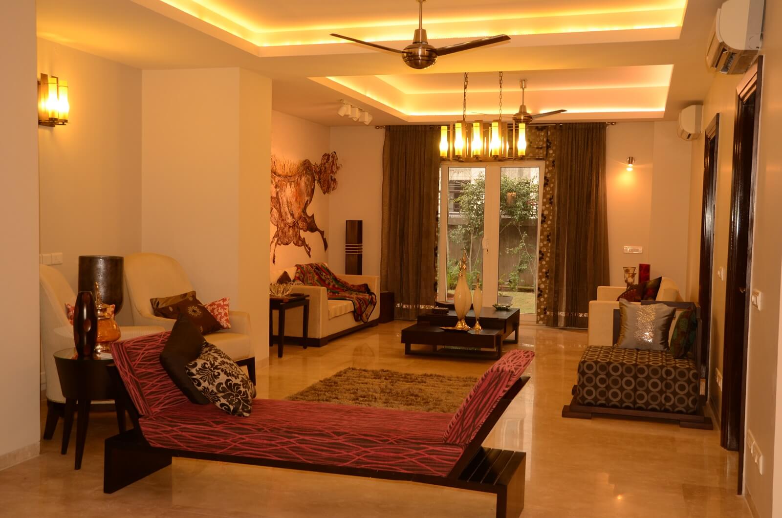 Villa living room at Palm Springs, Gurgaon by SpaceTalk Designs