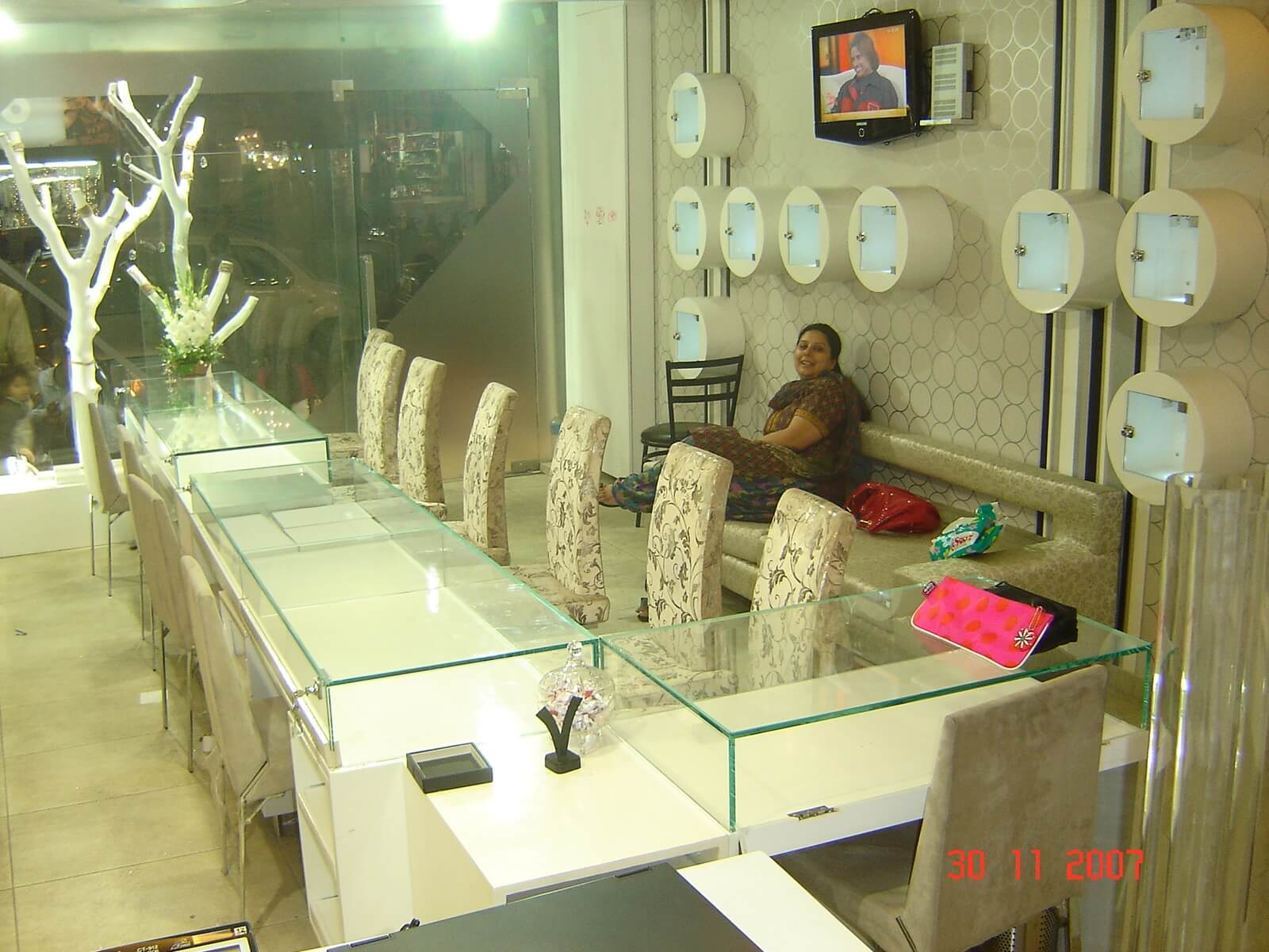 Client Jyoti Kapoor sitting inside her newly designed Kapoor Diamonds boutique