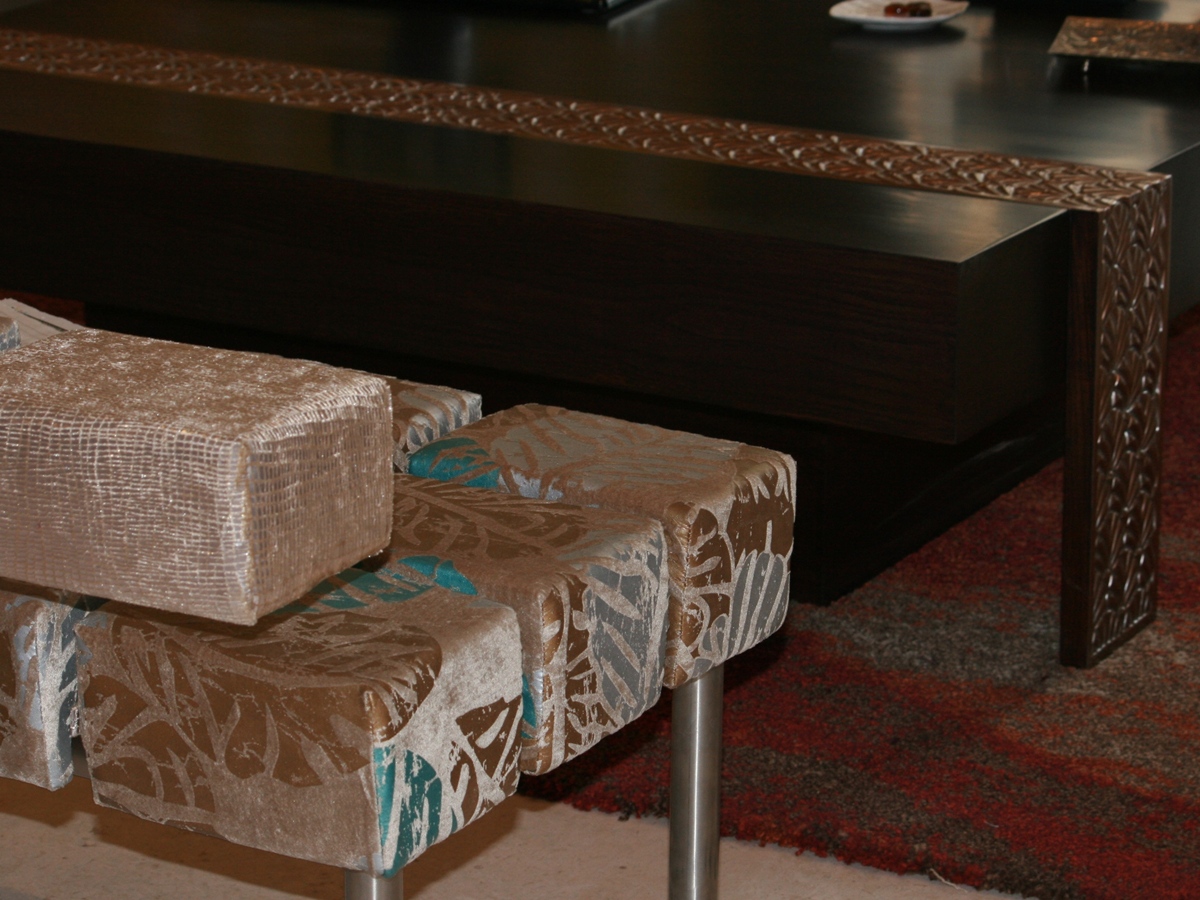 Close-up detail of checkerboard settee and coffee table by SpaceTalk Designs, Gurgaon