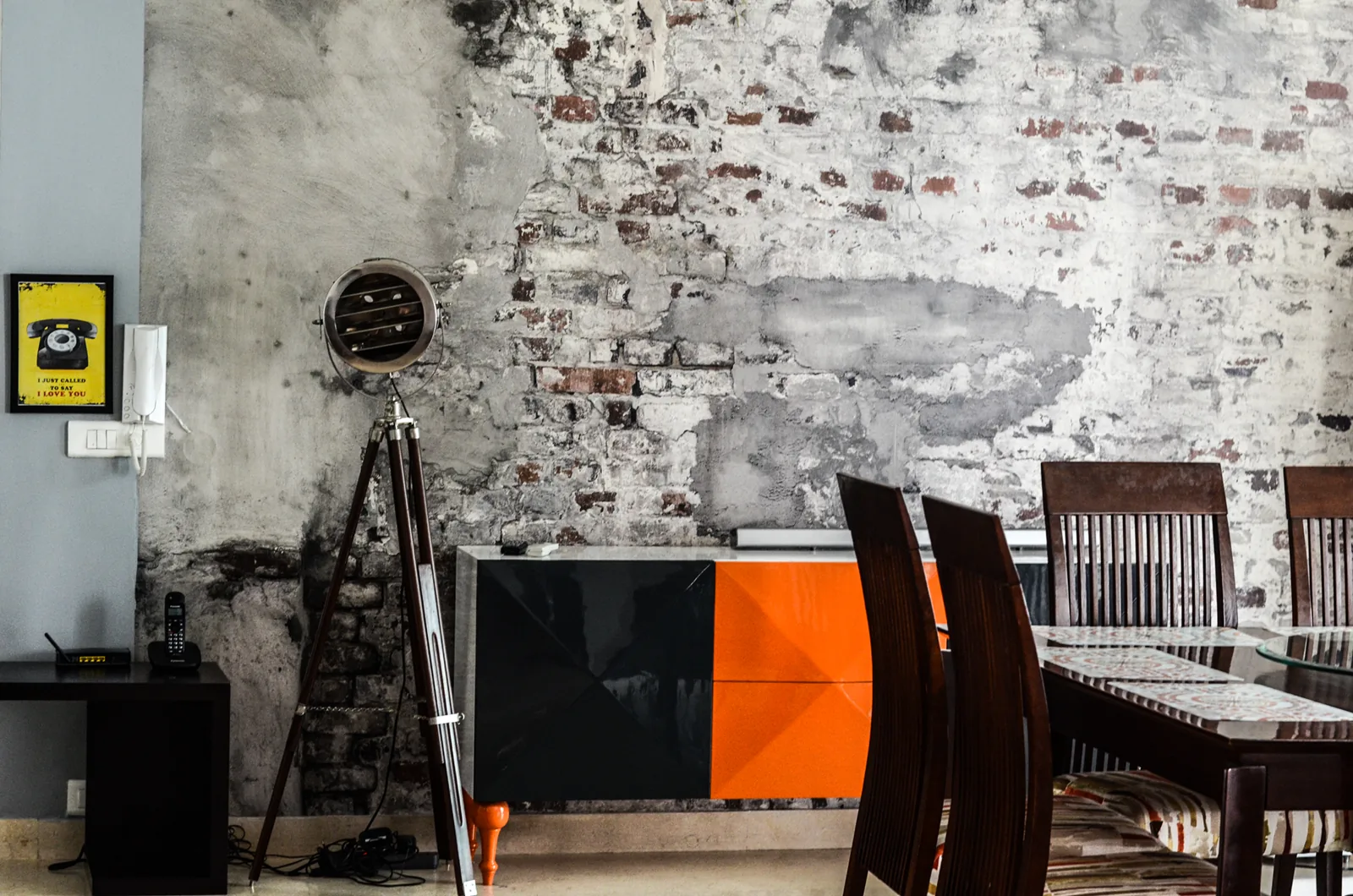 Brick print wall in industrial living room on Golf Course Extension Road, Gurgaon by SpaceTalk Designs